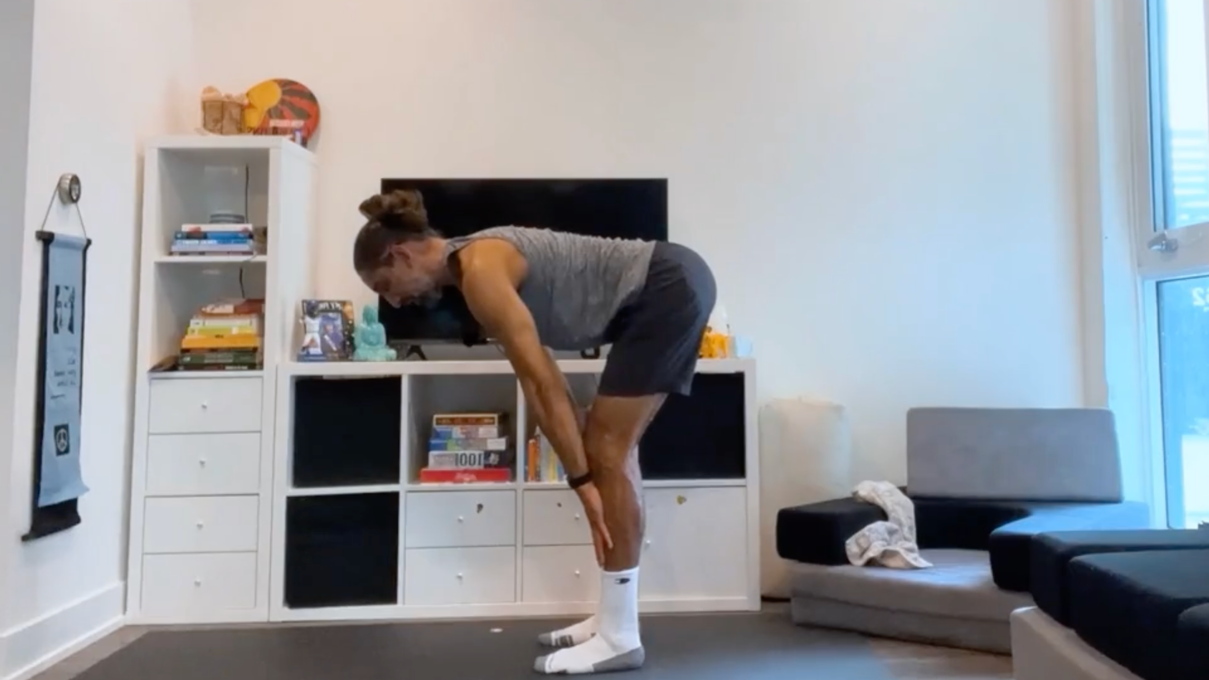 Teacher Jaffer Hussain in Halfway Lift, Ardha Uttanasana in Sanskrit